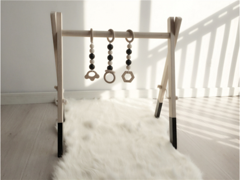 Wooden baby play gym set including hanging toys